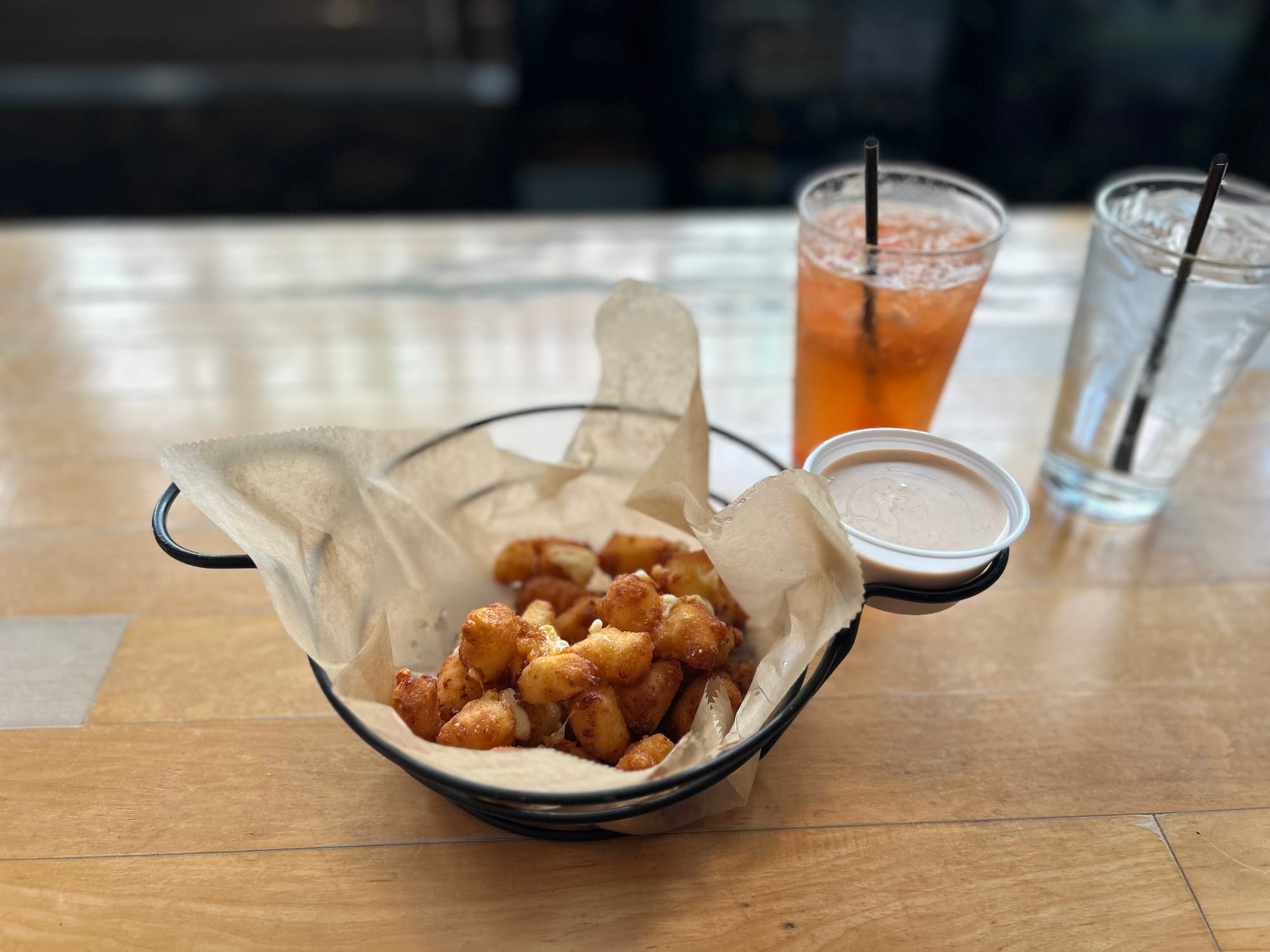 cheese curds, drink, dipping sauce, water