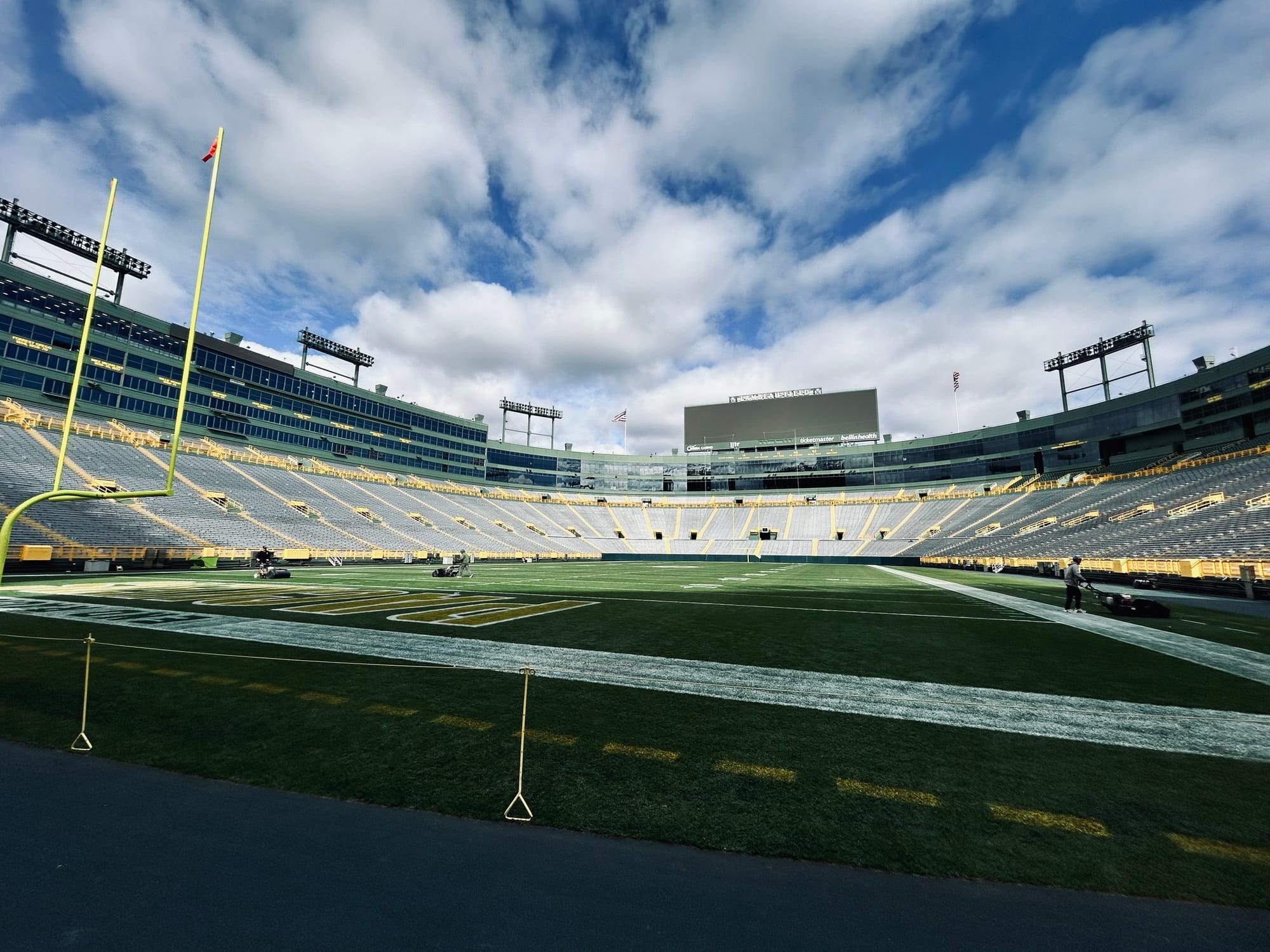 sky, clouds, grass field, markings, goal posts