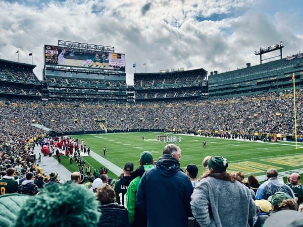 football stadium, turf, crowd, sky, clouds